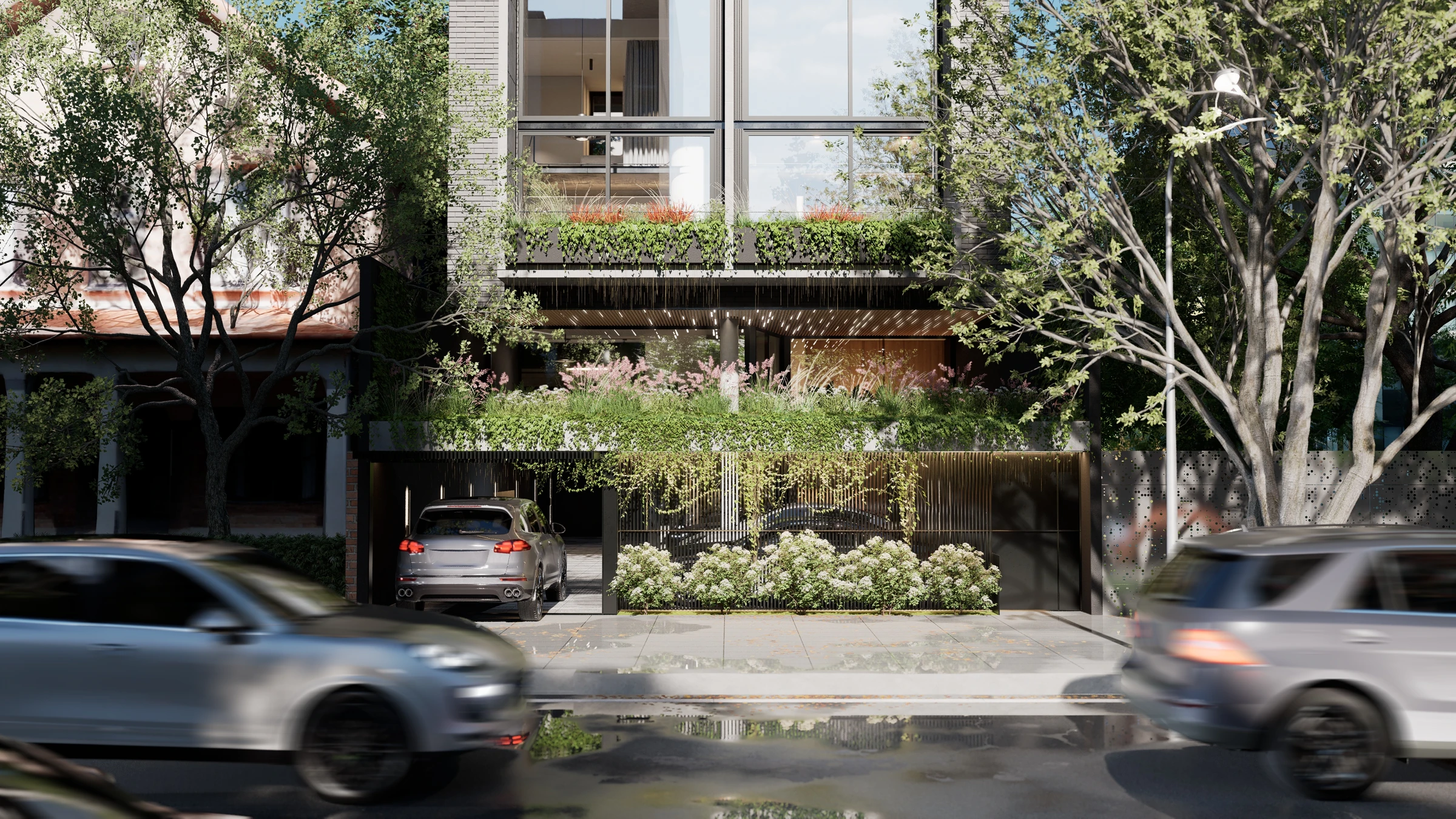 Fachada de Elevia Río con balcones y vegetación